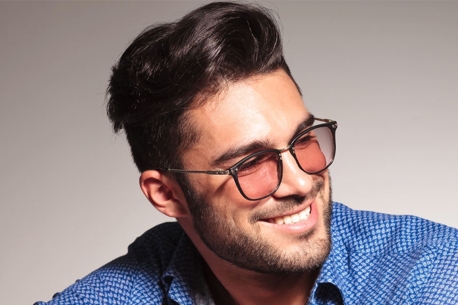 Portrait Of A Handsome Fashion Man With Thick Hair