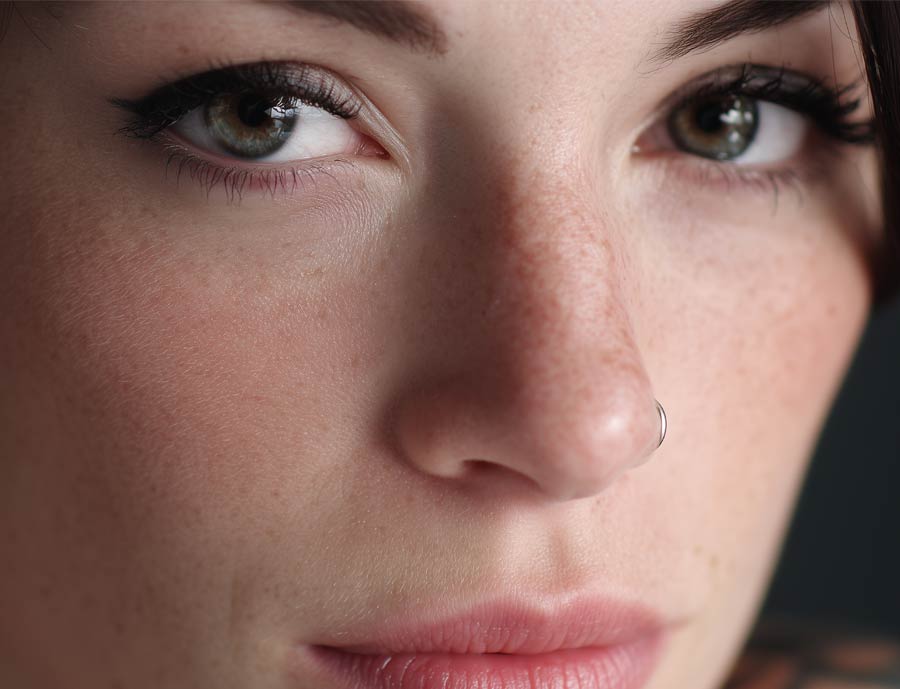 upclose photo of a woman's nose and face
